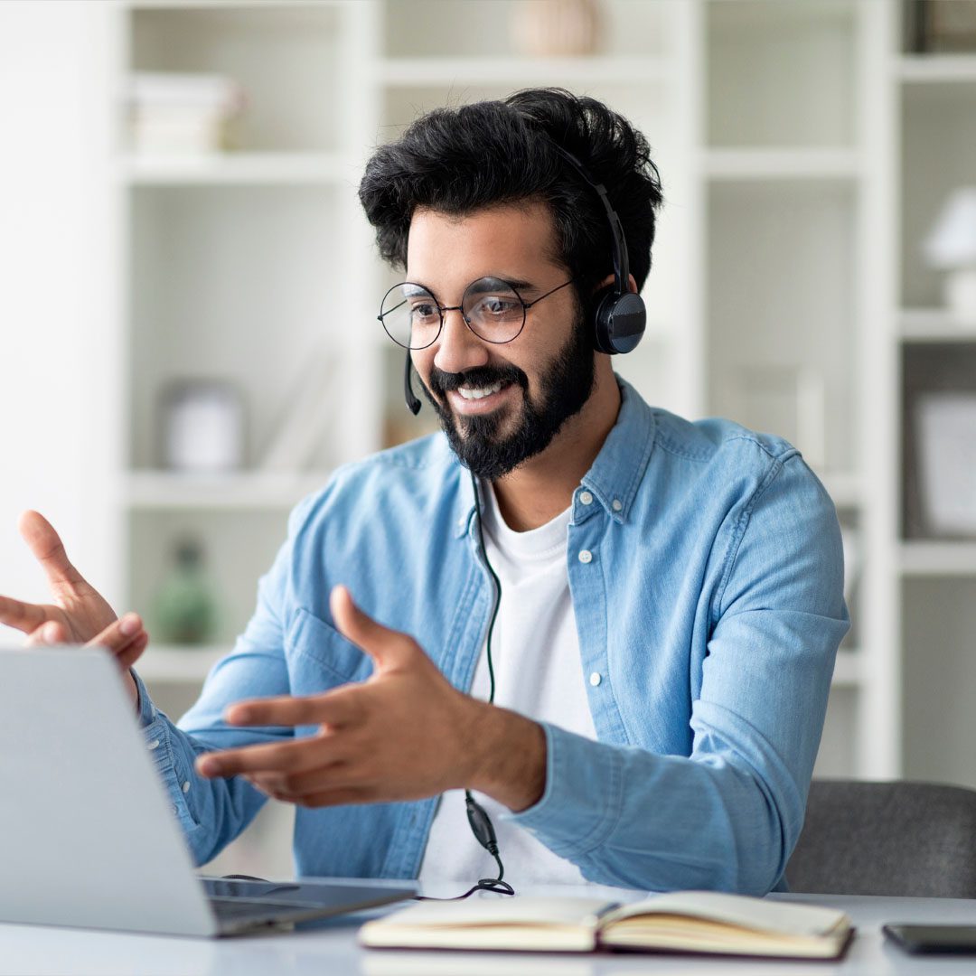Workday consultant delivering remote HR software training via video call wearing a headset